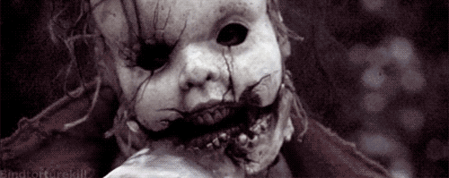 freaky doll halloween horror gif